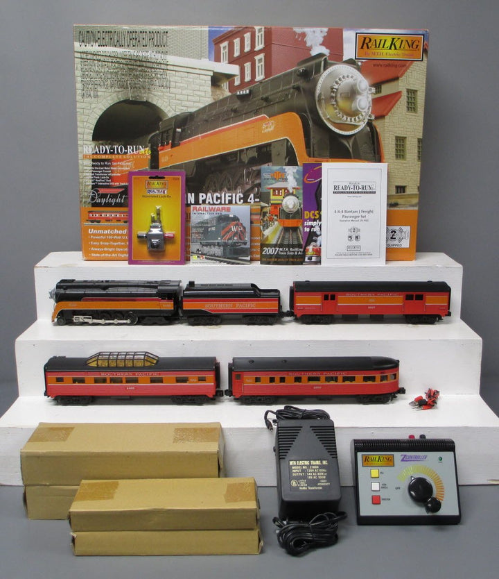 MTH RailKing Southern Pacific Daylight O Gauge locomotive and passenger consist showing Art Deco-era streamlining