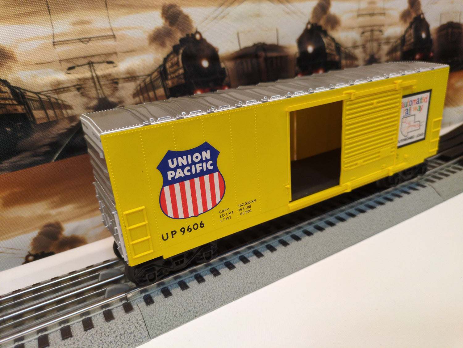 Lionel O gauge Freight Car on track