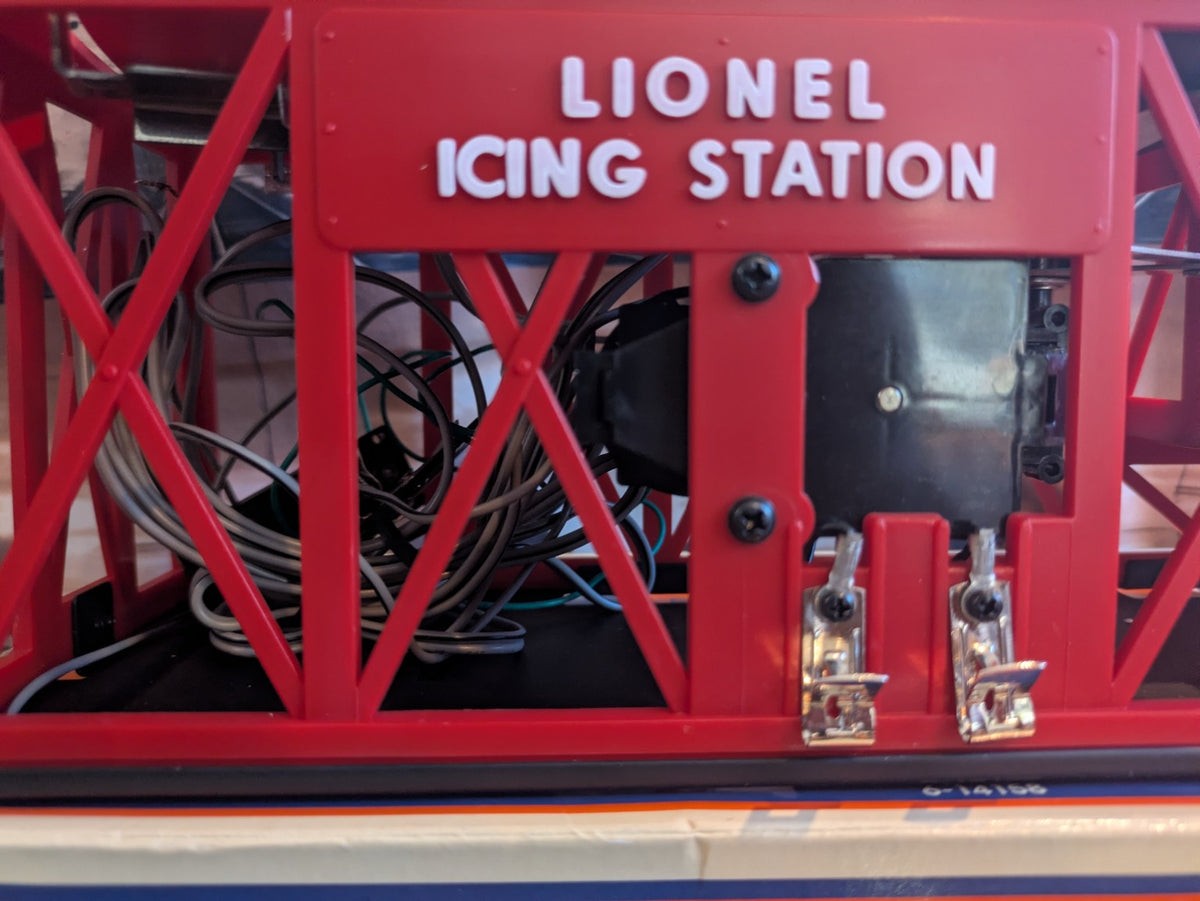 Lionel 6-14158 Icing Station close-up showing terminal clips, wiring and red frame