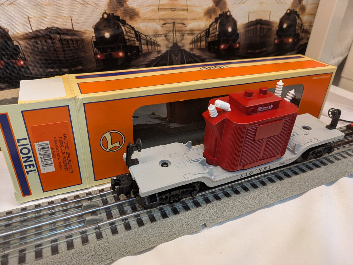 Lionel 6-16967 depressed-center flatcar with red transformer load, three-quarter view with Lionel box behind