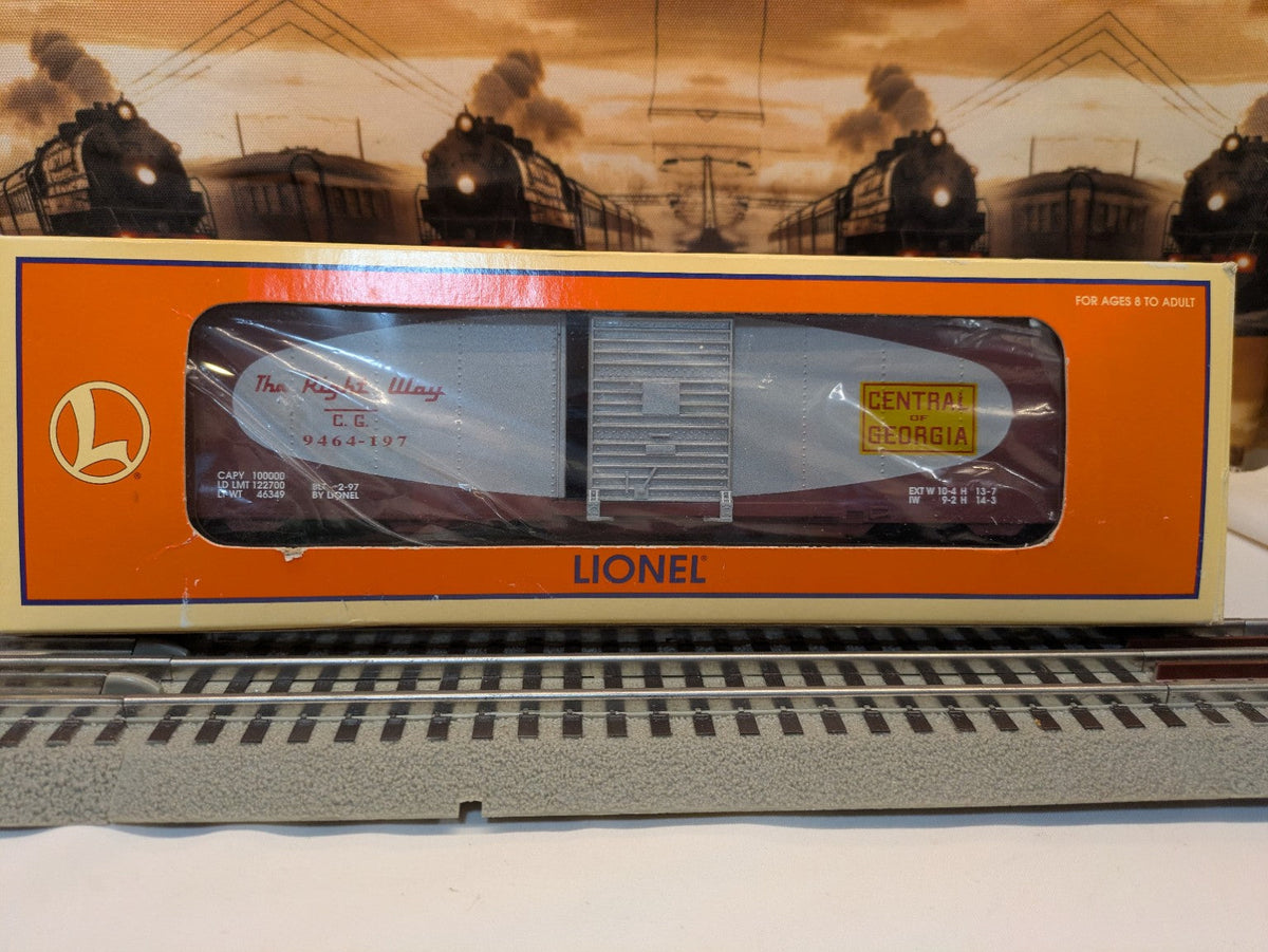 Lionel 6-17224 Central of Georgia brown box car shown through Lionel box window