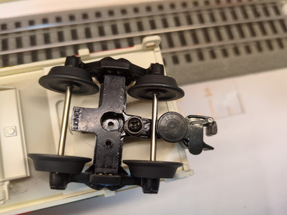 Lionel 6-19366 hopper underside close-up showing the opposite black die-cast truck and coupler