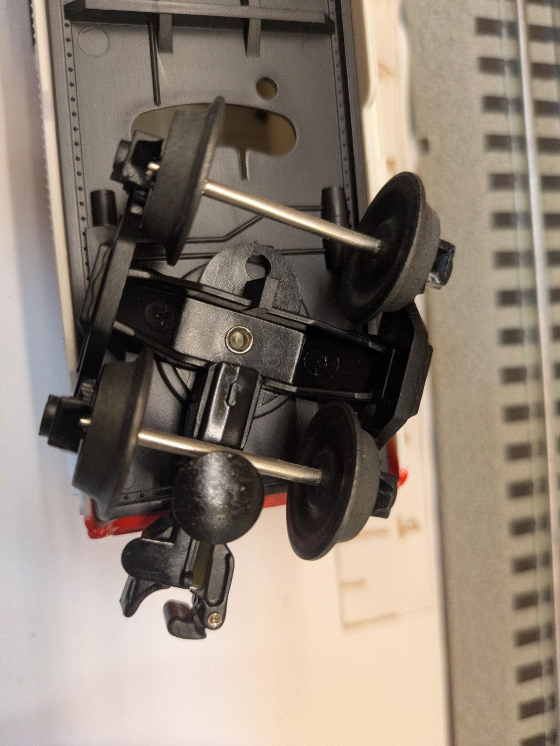 Lionel 6-26244 Woody Woodpecker Boxcar black truck and coupler, underside detail