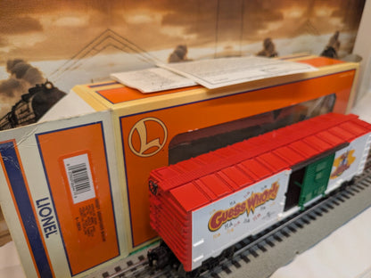 Lionel 6-26244 Woody Woodpecker Boxcar in red, white, and green, three-quarter view with Lionel box