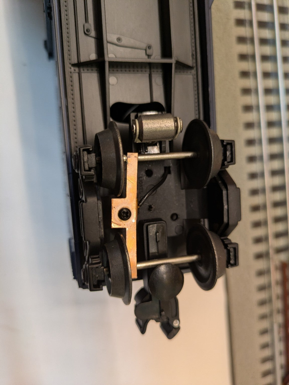 Lionel 6-26717 underside truck, wheelset, and pickup assembly detail