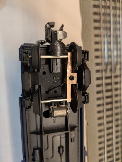 Lionel 6-26717 underside coupler, truck, wheelset, and pickup roller detail
