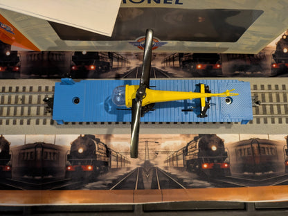 Top view of Lionel 6-29827 Helicopter Launch Car with yellow helicopter