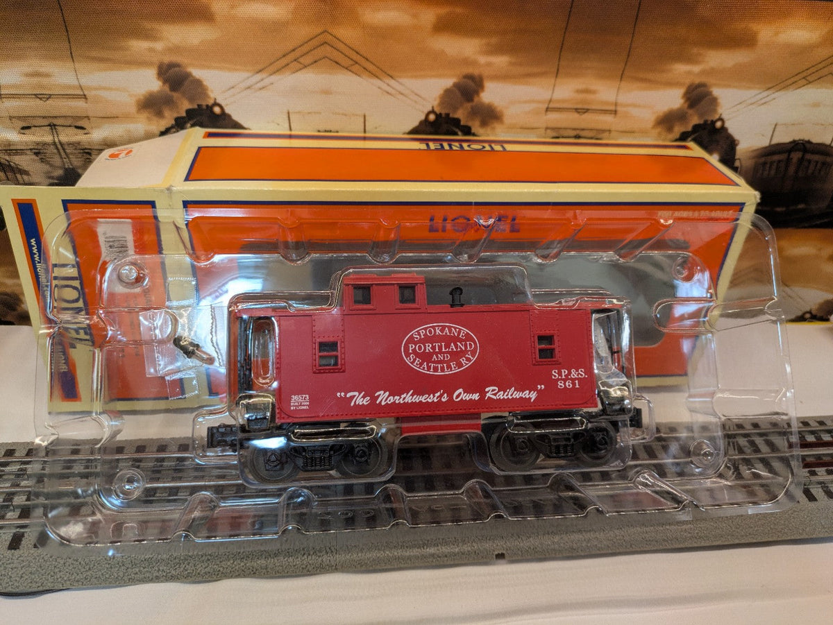 Lionel 6-36573 red SP&S caboose in clear packaging with Lionel box visible