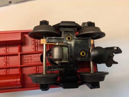 Lionel 6-36573 red SP&S caboose underside detail with Lionel marking, truck, and coupler