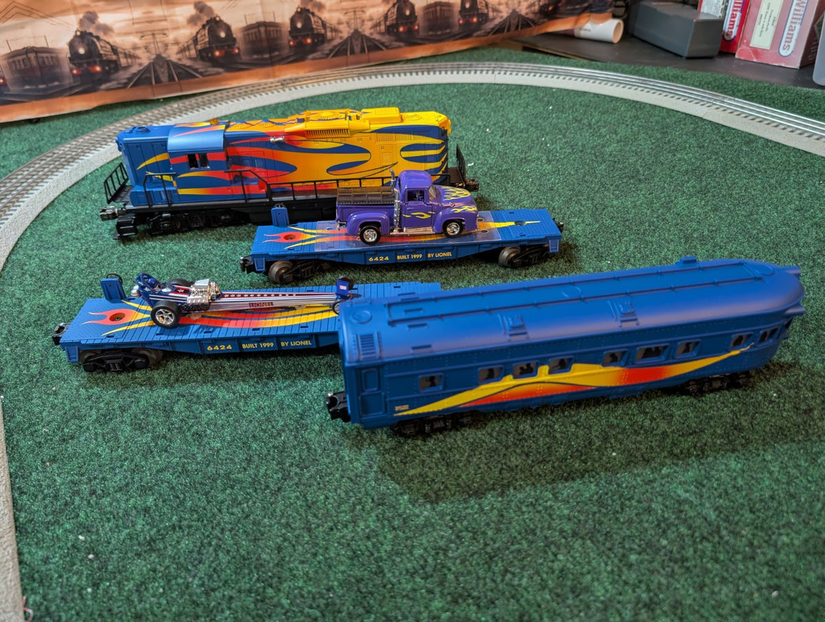 Lionel Custom Hot Rod Set with locomotive, hot rod flatcars, and passenger car
