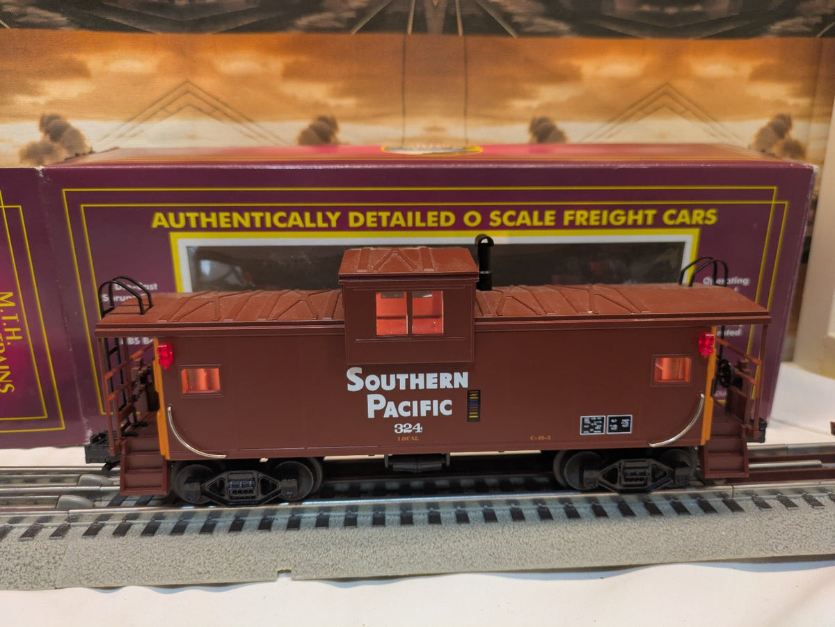 MTH Southern Pacific 324 O scale caboose full side view with illuminated windows