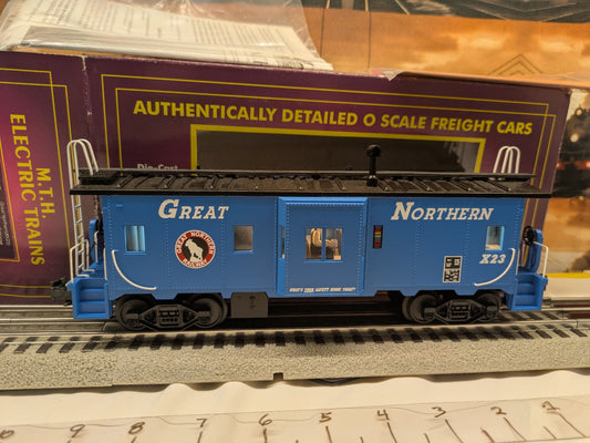 MTH 20-91073 Great Northern X23 blue bay-window caboose broadside view