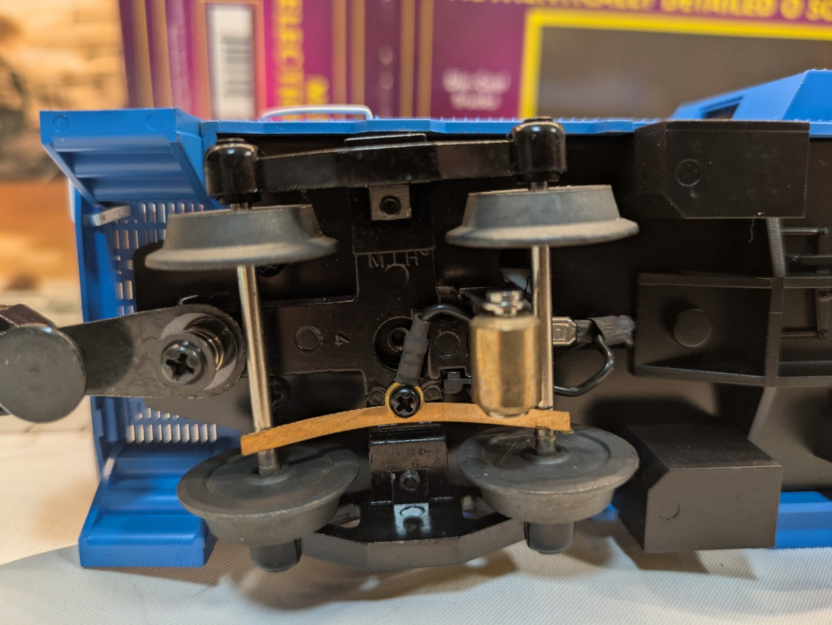 MTH 20-91073 Great Northern X23 caboose truck, pickup roller, and coupler detail