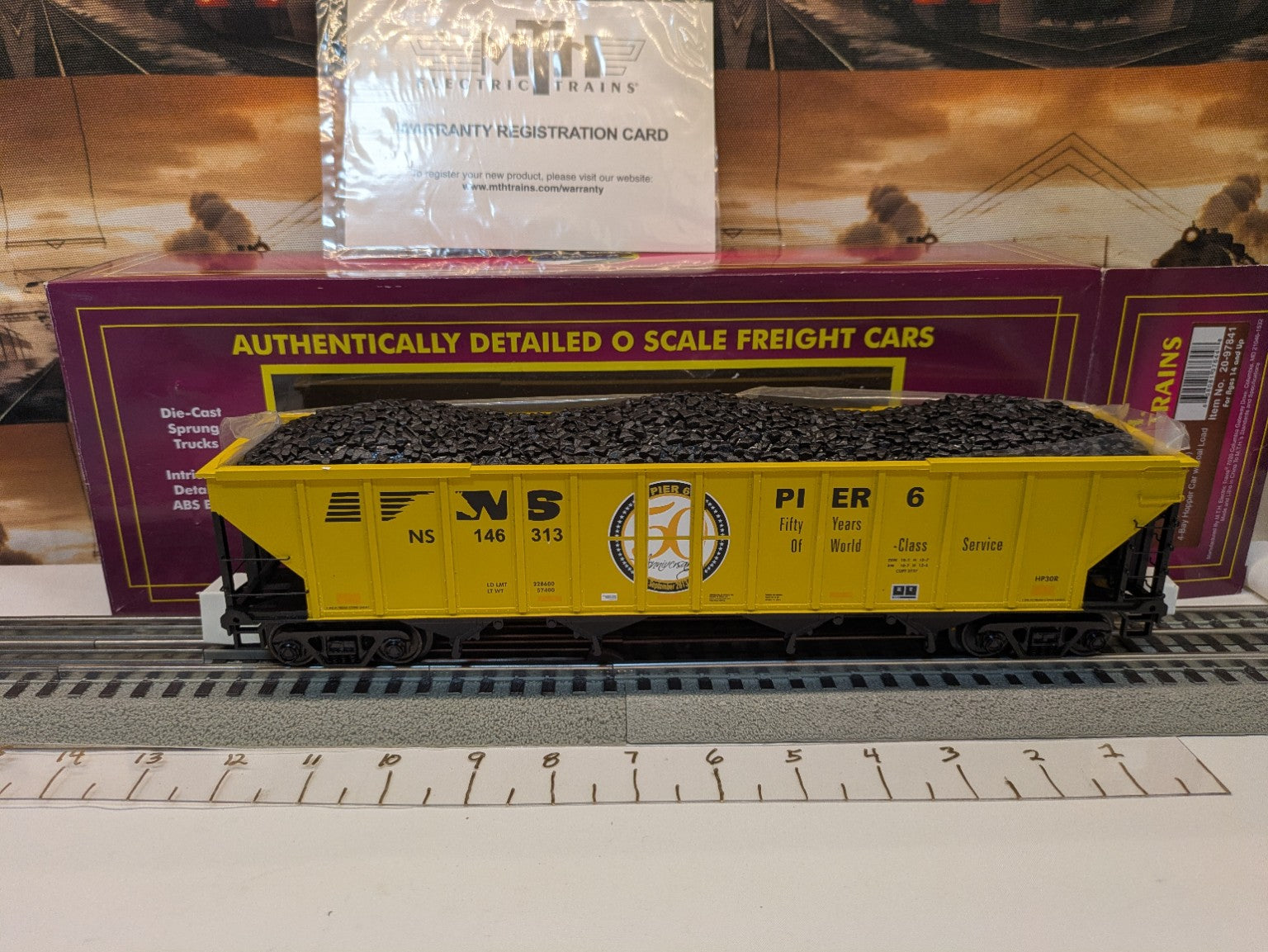MTH Premier 20-97841 Norfolk Southern 4-bay hopper car with coal load, side view