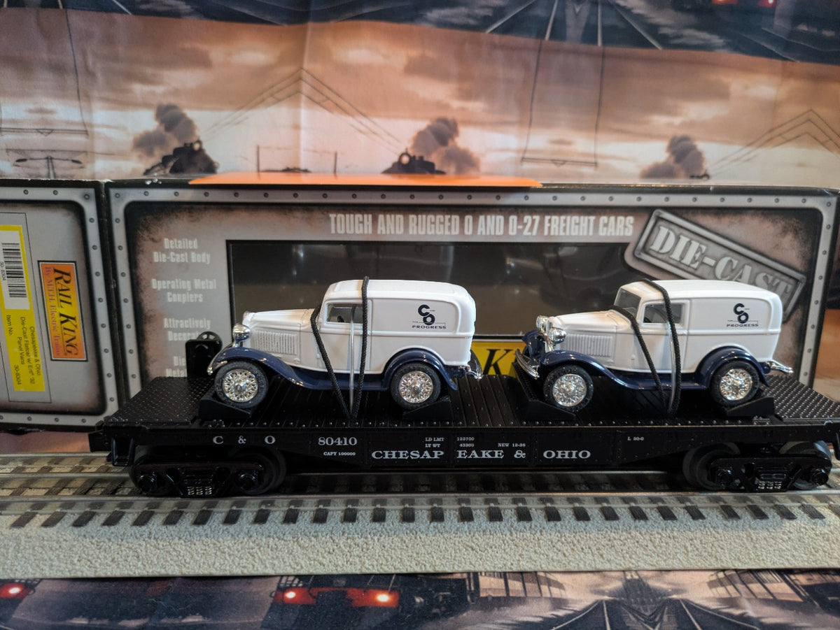 MTH 30-8304 Chesapeake & Ohio black flatcar with two white panel vans, side view