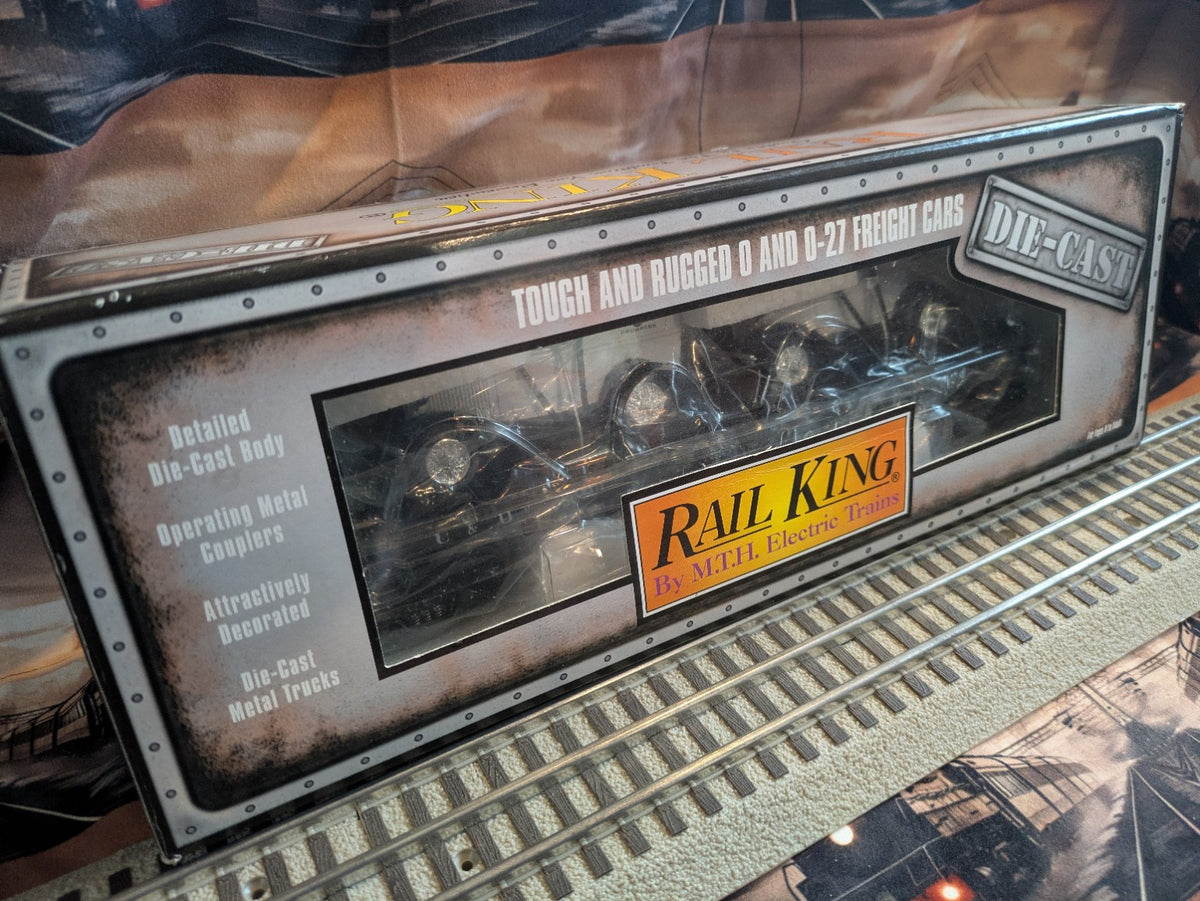 MTH 30-8304 Rail King box with Chesapeake & Ohio flatcar visible through window, angled view