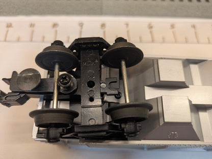 MTH 33-7503 Union Pacific covered hopper die-cast truck and operating coupler underside detail