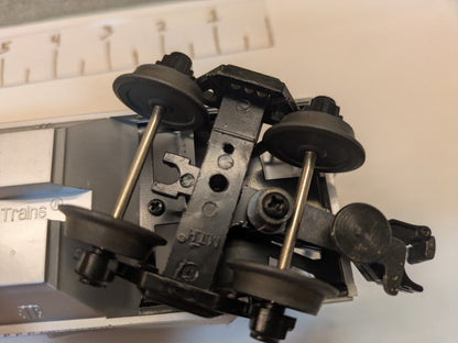MTH 33-7503 Union Pacific covered hopper second truck and operating coupler underside detail