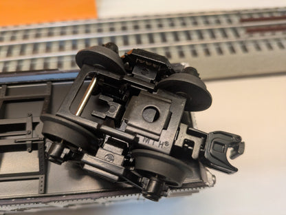 MTH Rail King 30-74265 Oakland Raiders boxcar, underside close-up of black truck, wheels and coupler
