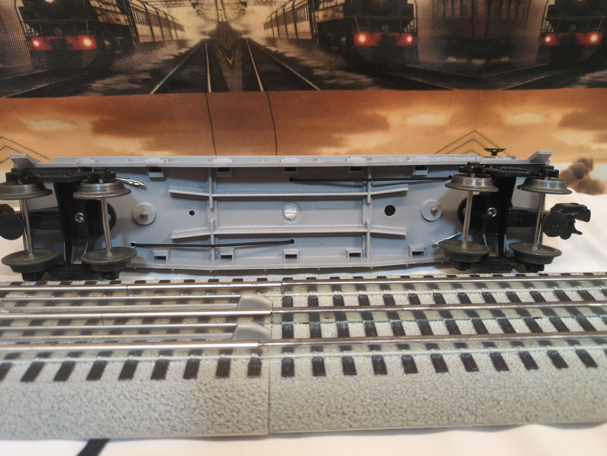 Lionel flat car with farm tractors 6-16907